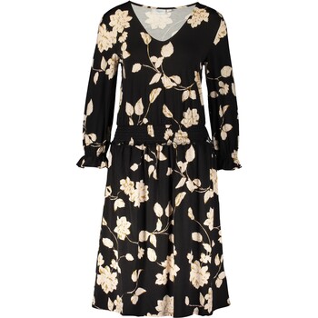 Sukienka w kwiaty z długim rękawem