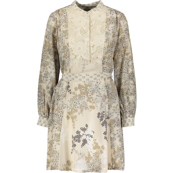 Kremowa sukienka odcięta w pasie