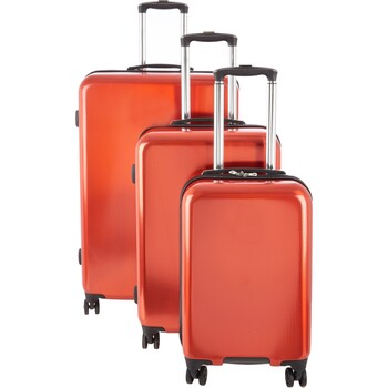 Czerwona walizka na kółkach